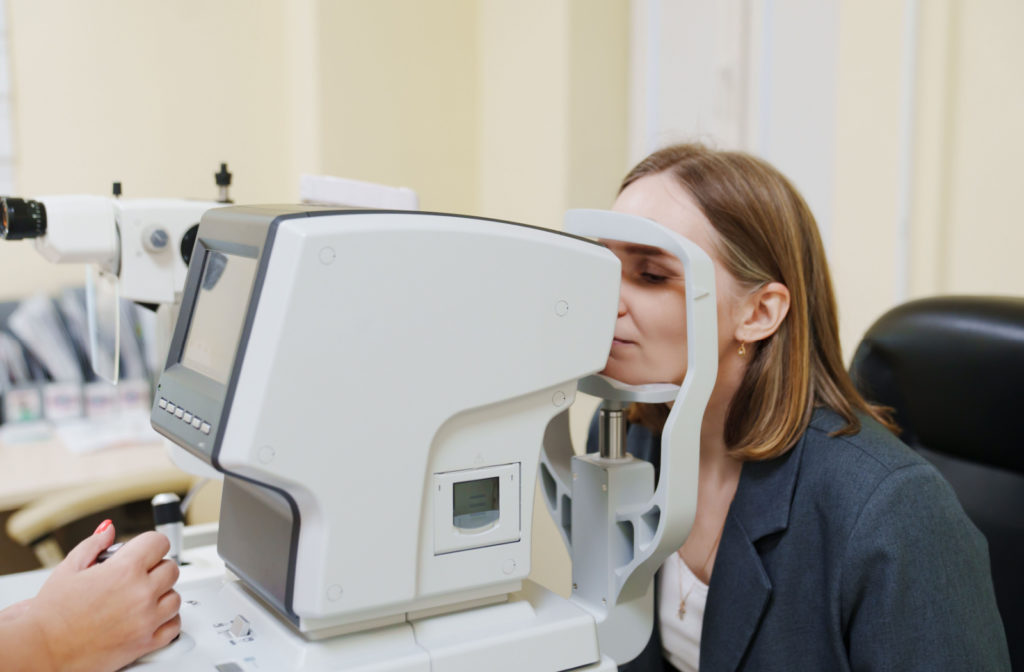 A middle aged woman undergoing a diabetic eye examination.