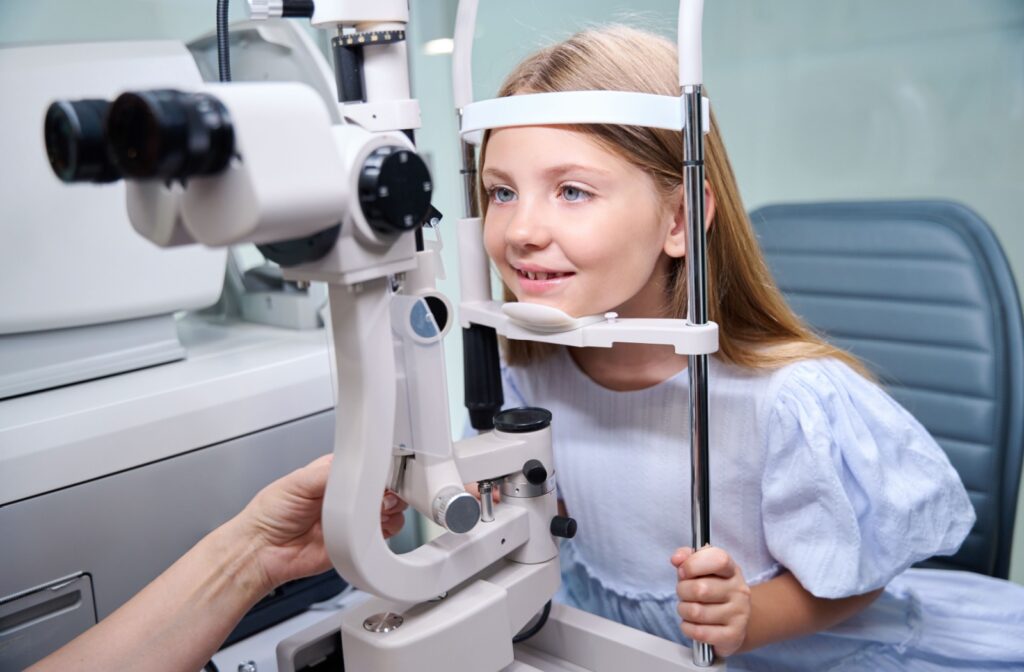 A child at an eye exam, determining if they are a candidate for myopia control.
